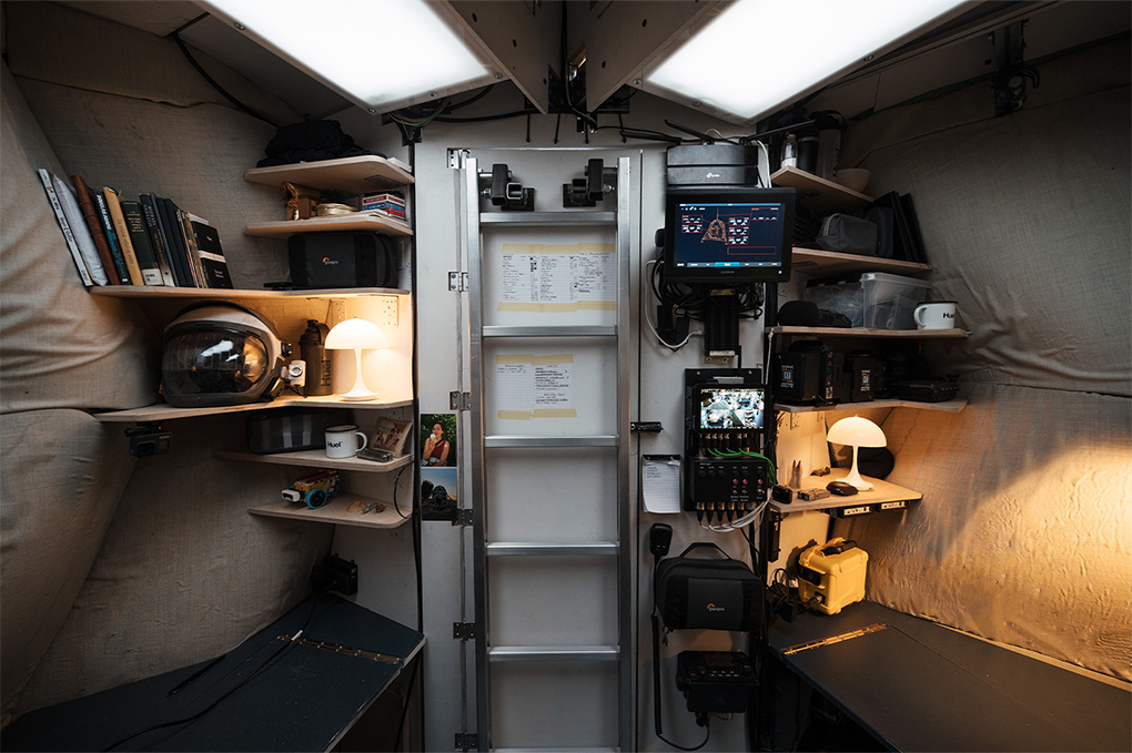  The main living room, to the right is Sebastian's desk, to the left is Karl’s desk. In the middle is the ladder going up to the private sleeping cabins